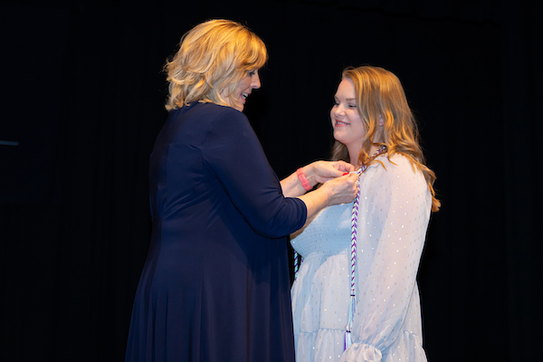 Graduate receiving her pin during the nurse's pinning ceremony.